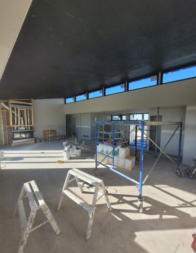 Drywall Installation Perfectly done in great room along walls. Drywall and taping in a new house.