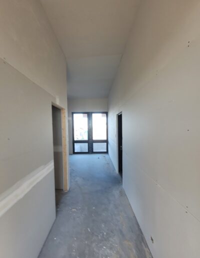 Drywall Installation Perfectly done in hallway. Drywall and taping in a new house.