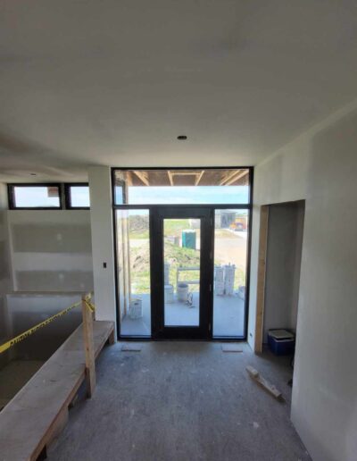 Perfectly done Drywall Installation around Door. Drywall and taping in a new house.