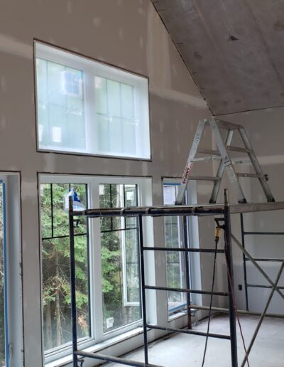 Drywall Installation Perfectly done around scaffolding. Drywall and taping in a new house.