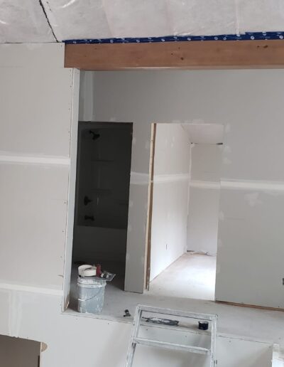 Drywall Installation Perfectly done around scaffolding. Drywall and taping in a new house.