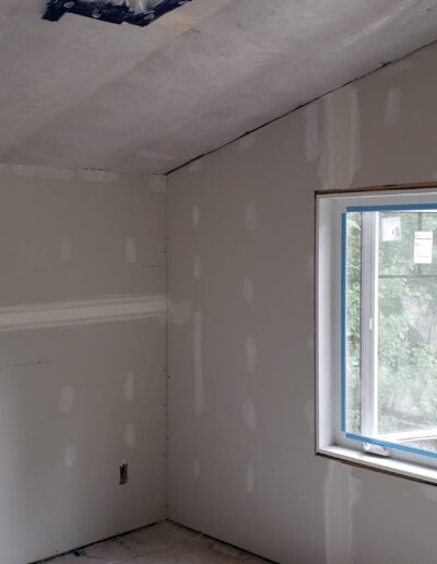 Drywall Installation Perfectly done around scaffolding. Drywall and taping in a new house.