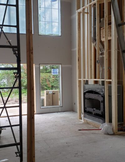 Drywall Installation Perfectly done around fire place. Drywall and taping in a new house.