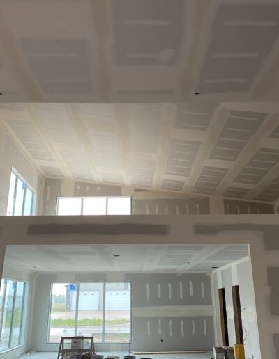 Drywall Installation Perfectly done on ceilings and walls. Drywall and taping in a new house.