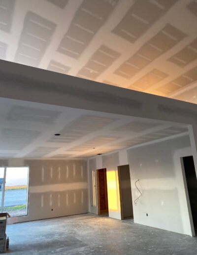 Drywall Installation Perfectly done on ceilings and walls. Drywall and taping in a new house.