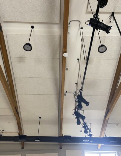 Stage room for performances. Large vaulted ceilings with acoustic paneling for sound absorption