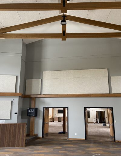 Stage room for performances. Large vaulted ceilings with acoustic paneling for sound absorption