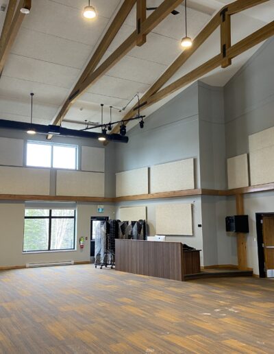 Stage room for performances. Large vaulted ceilings with acoustic paneling for sound absorption